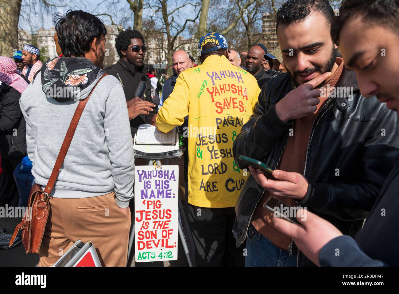A man speaking about what is the right name of the son of god, Speakers