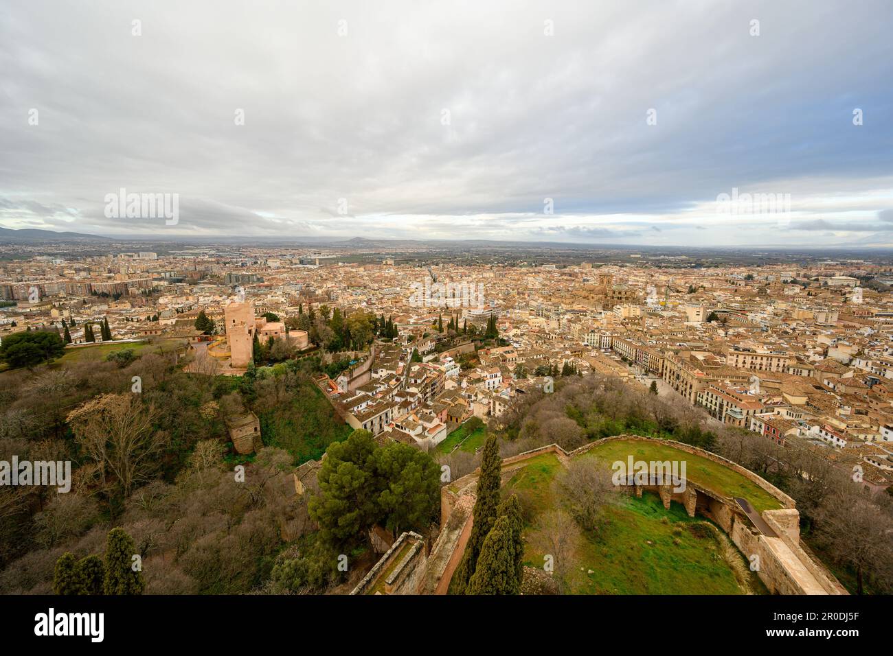 The walls of the Alcazaba in the Alhambra and the panorama of Granada, Spain Stock Photo
