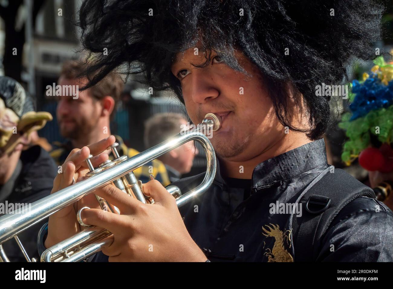 Funchal town, Madeira, Portugal. February Community Carnival held a few days before the main Carnival. Boy Trumpeter Stock Photo