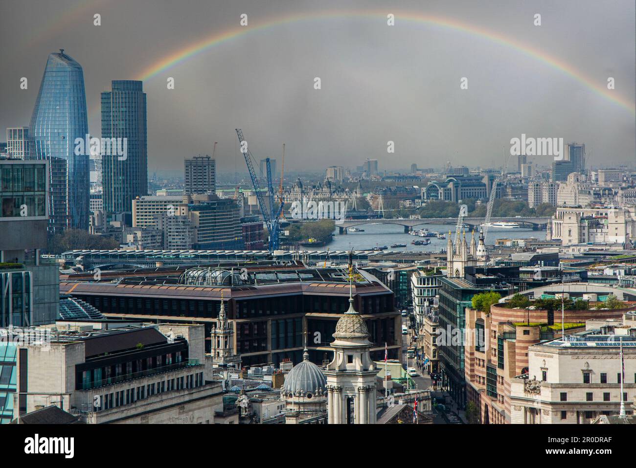 A double rainbow over the City of London and River Thames Stock Photo