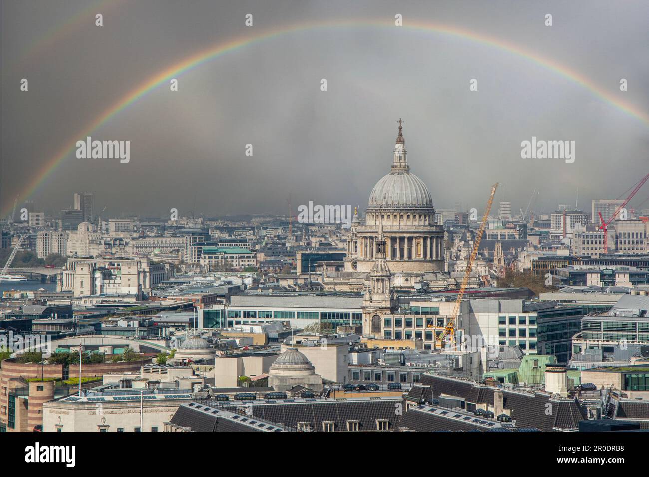 A double rainbow over the City of London and River Thames Stock Photo