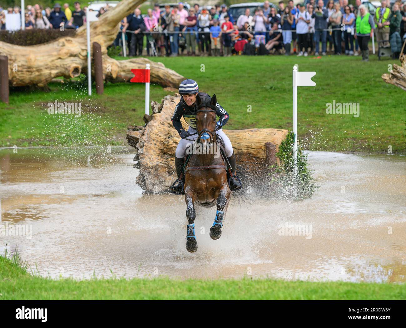 Badminton, UK. 07th May, 2023. 07 May 2023 - Badminton Horse Trials - Cross-Country Test - Badminton - Gloucestershire Alexander Bragg rides Quindiva during the Cross-Country Test at the Badminton Horse Trials. Picture Credit: Mark Pain/Alamy Live News Stock Photo