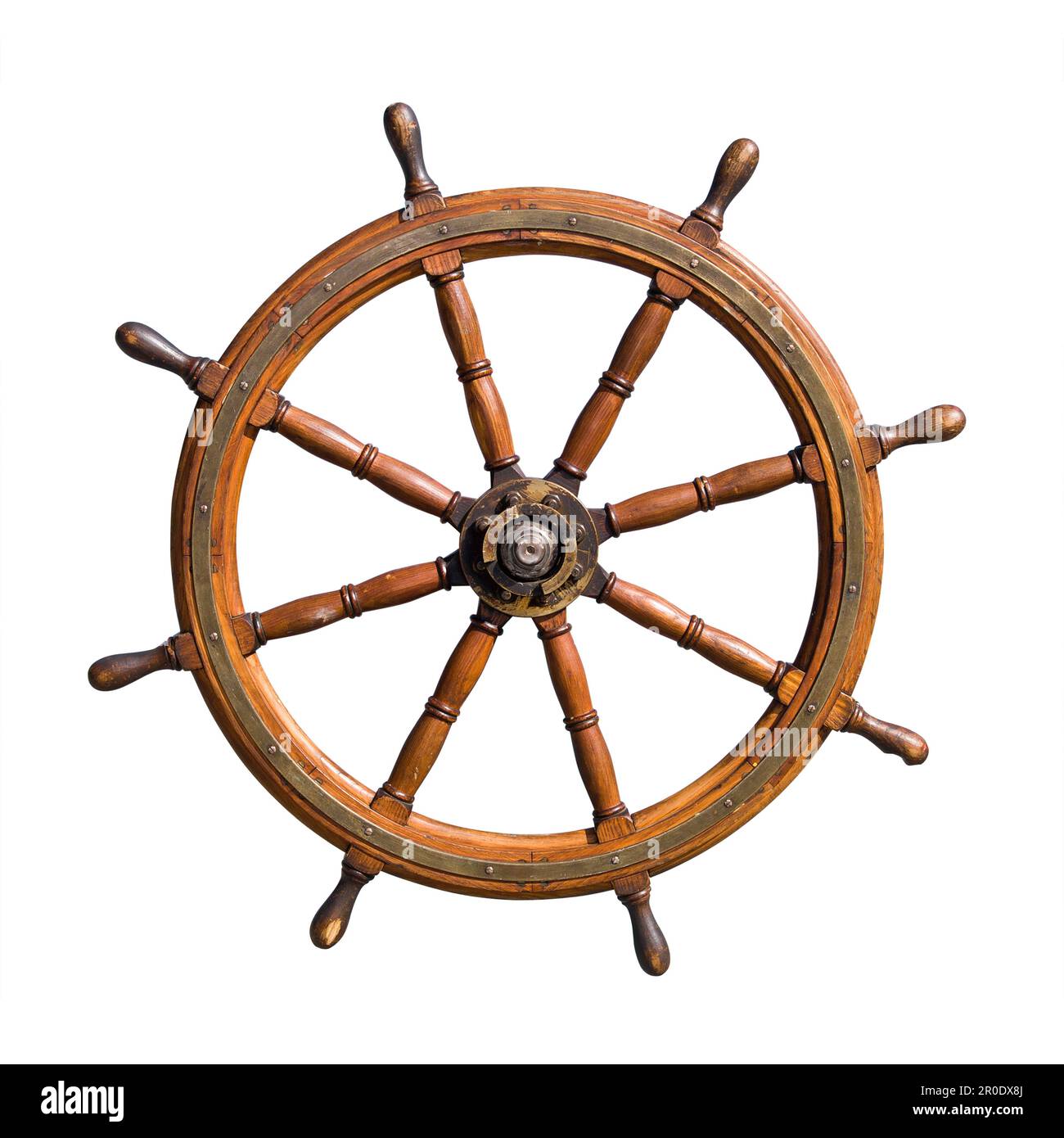 Old seasoned boat steering wheel isolated on white background Stock