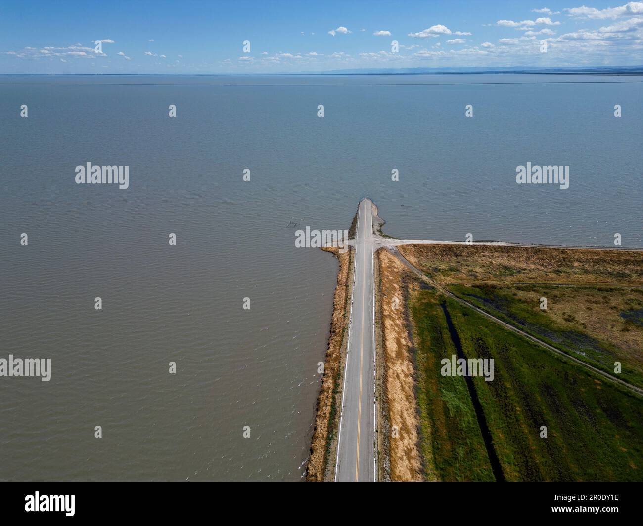Aerial view of the Spring 2023 flood from Sierra Nevada Mountains filling a new vast Lake Tulare in California Stock Photo