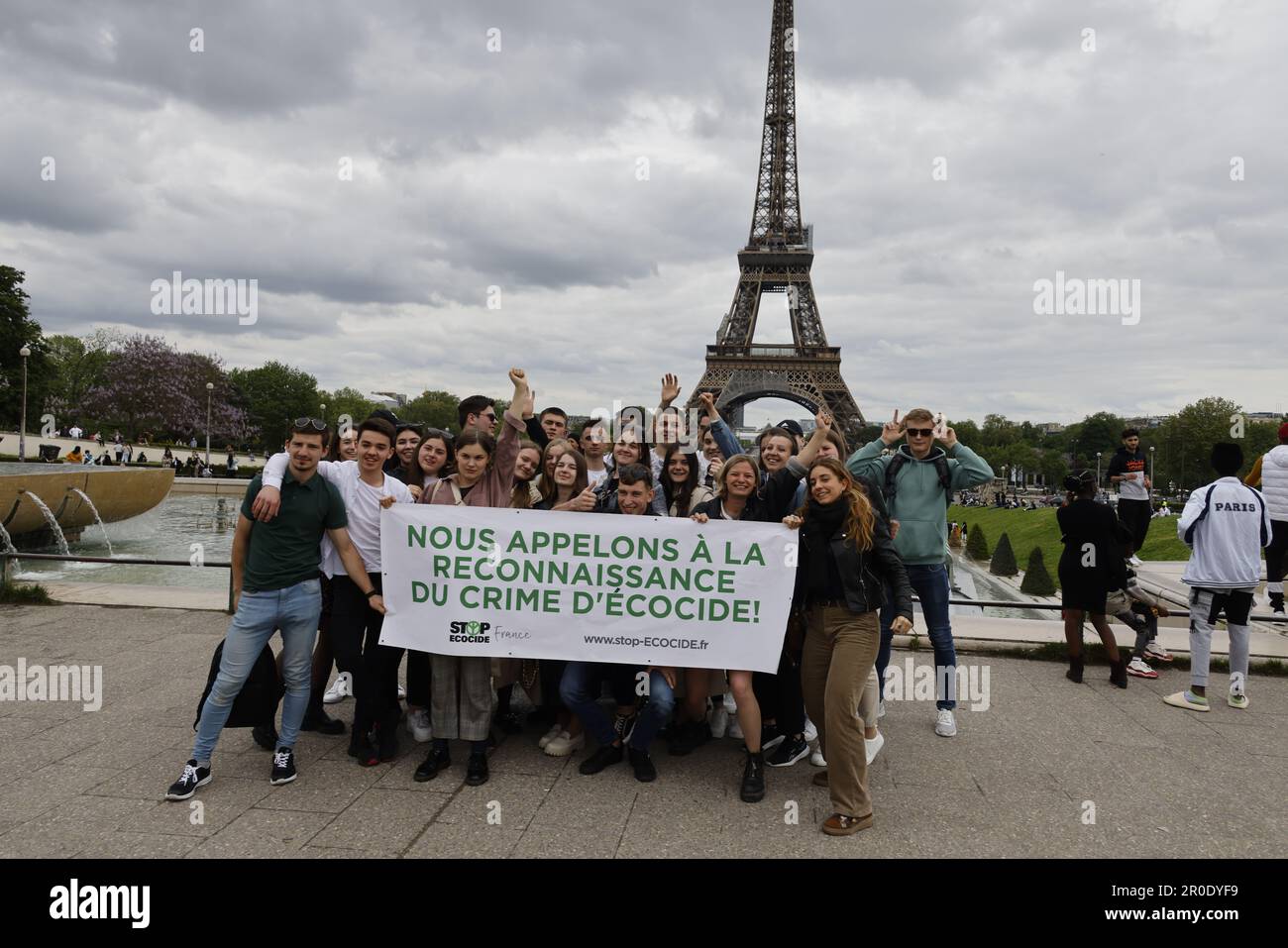 Paris, France. 8th May, 2023. Activists unfurl a banner calling for the recognition of ecocide crimes on May 8, 2023 at the Trocadero in Paris, France. Credit: Bernard Menigault/Alamy Live News Stock Photo