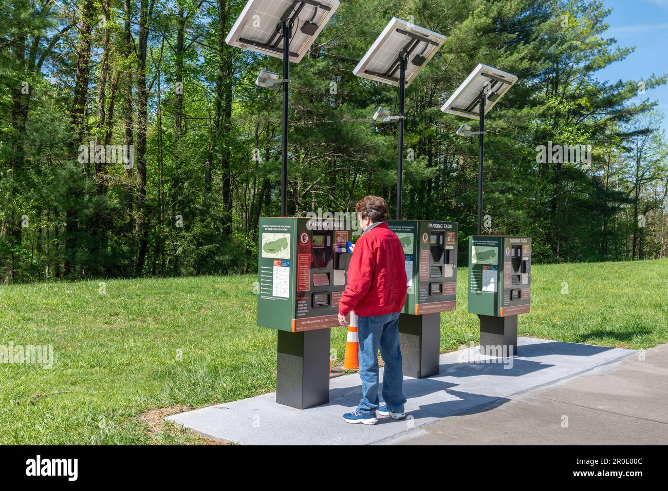 Cades Cove, Tennessee, United States – April 24, 2023: Horizontal shot of a Cades Cove Visitor purchasing the newly-required Great Smoky Mountain Nati Stock Photo