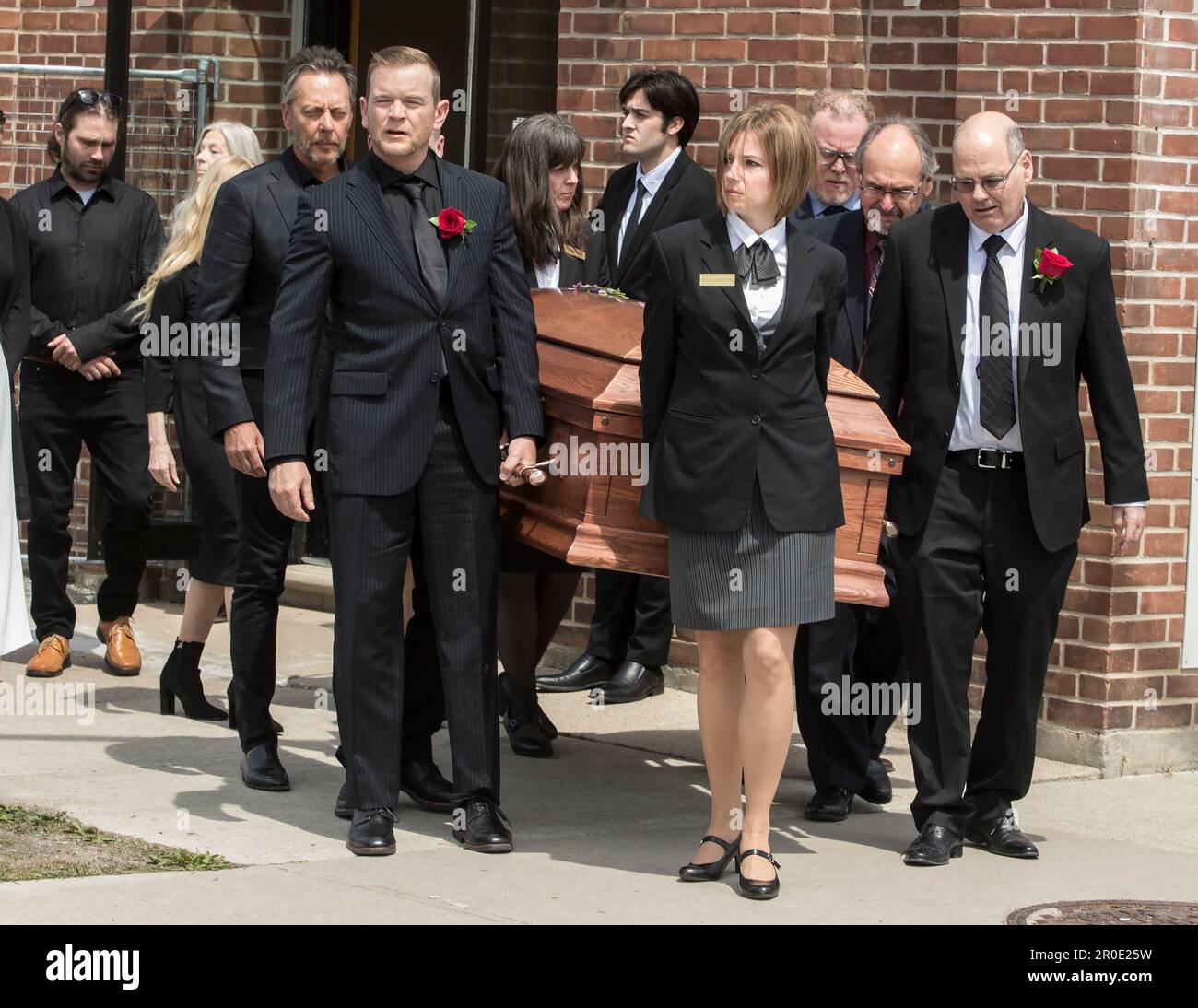Family members carry the casket of singersongwriter Gordon Lightfoot