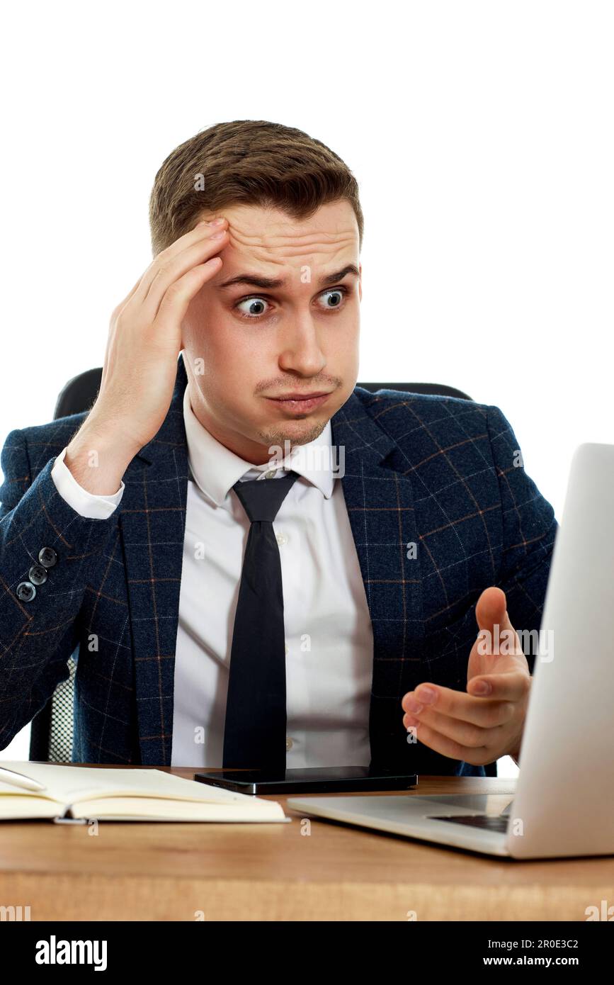 businessman using laptop having problems thinking about troubles Stock Photo