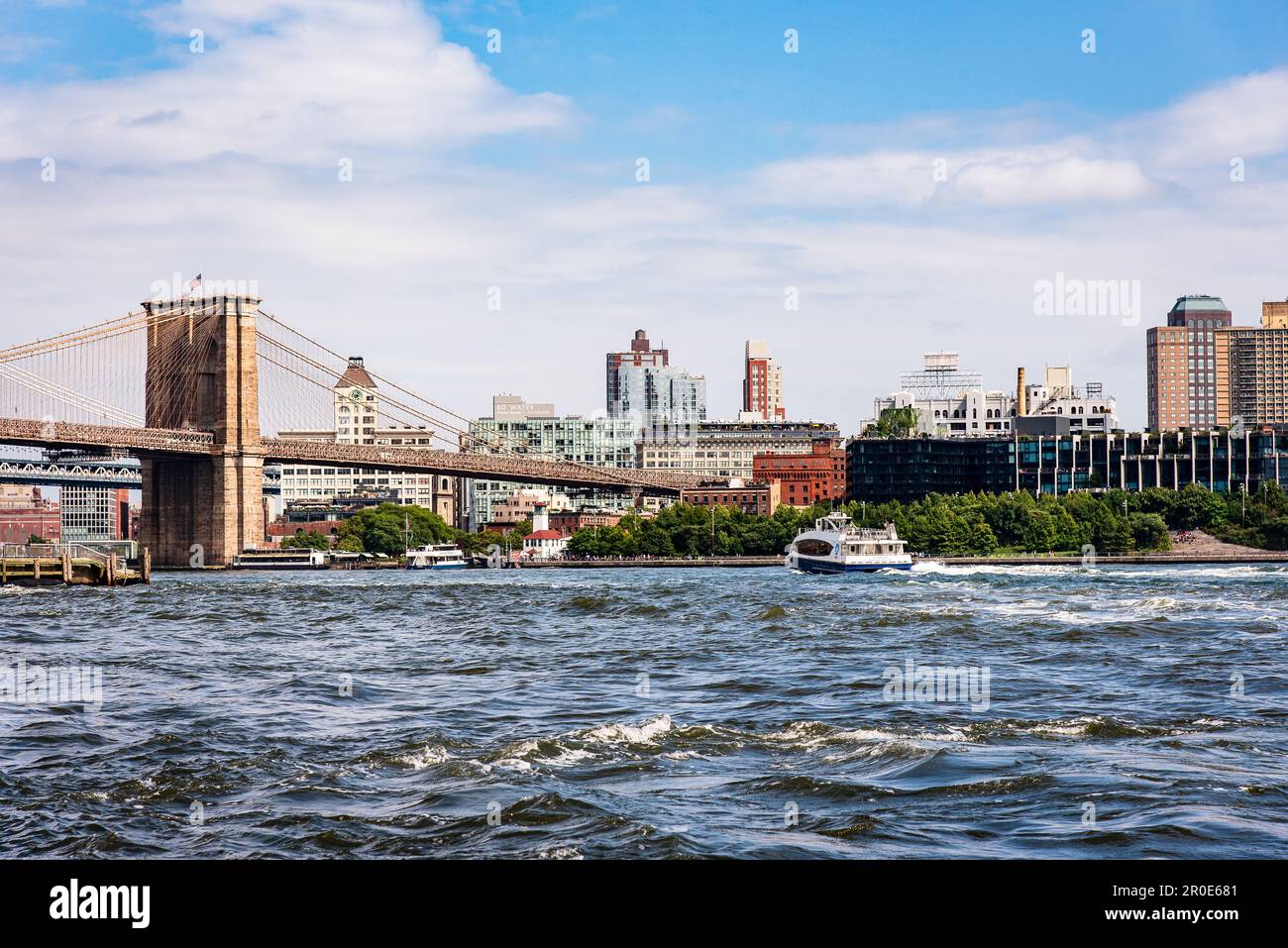 A view of the Brooklyn Bridge over the East River, Manhattan, New York ...