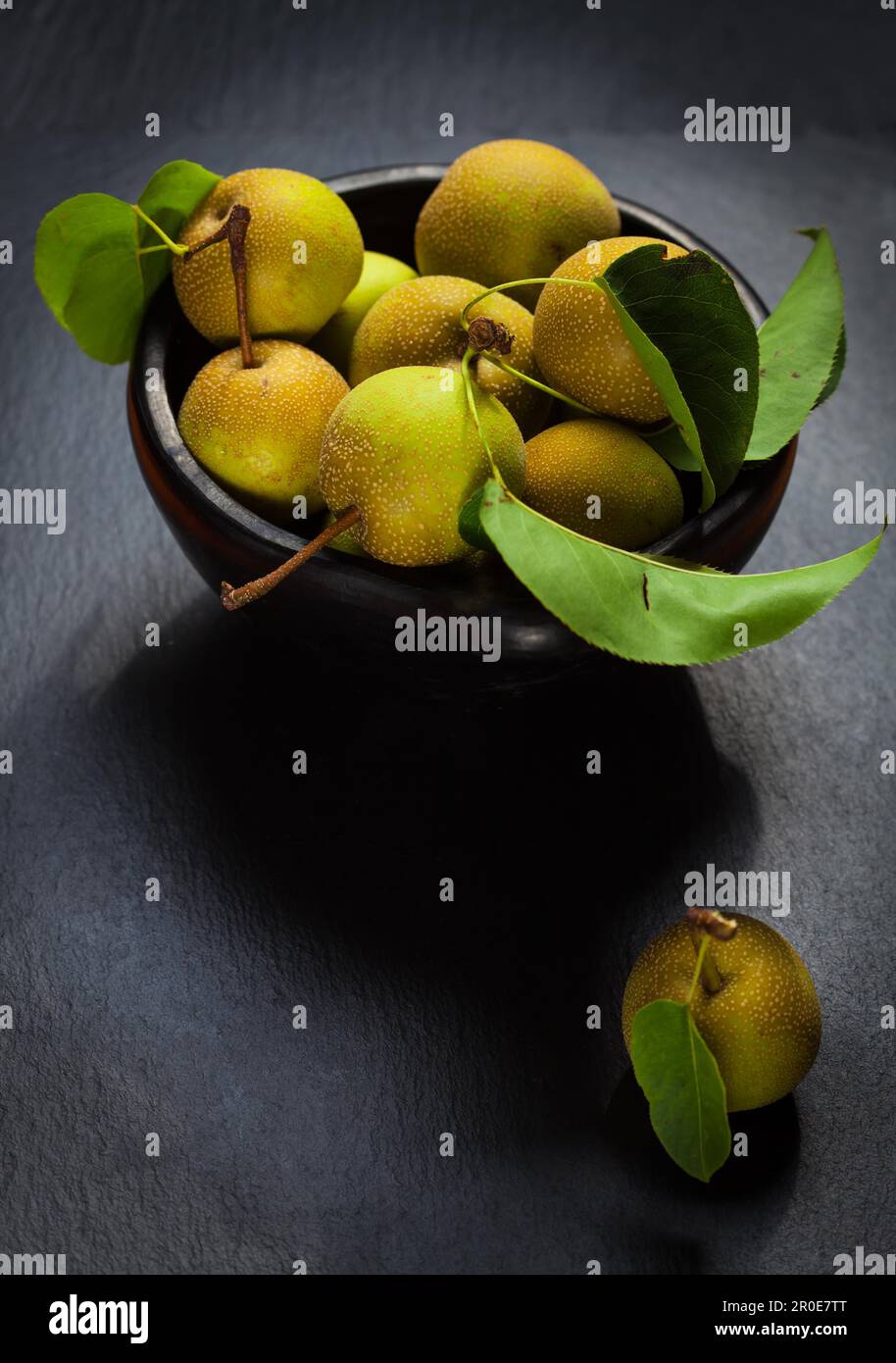 Non-GMO bio apples in bowl Stock Photo