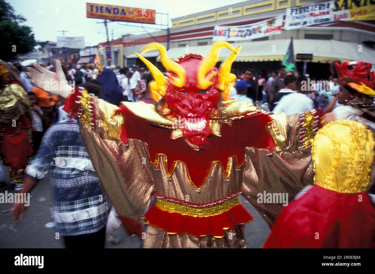 People celebrating carnival on the streets, La Vega, Dominican Republic