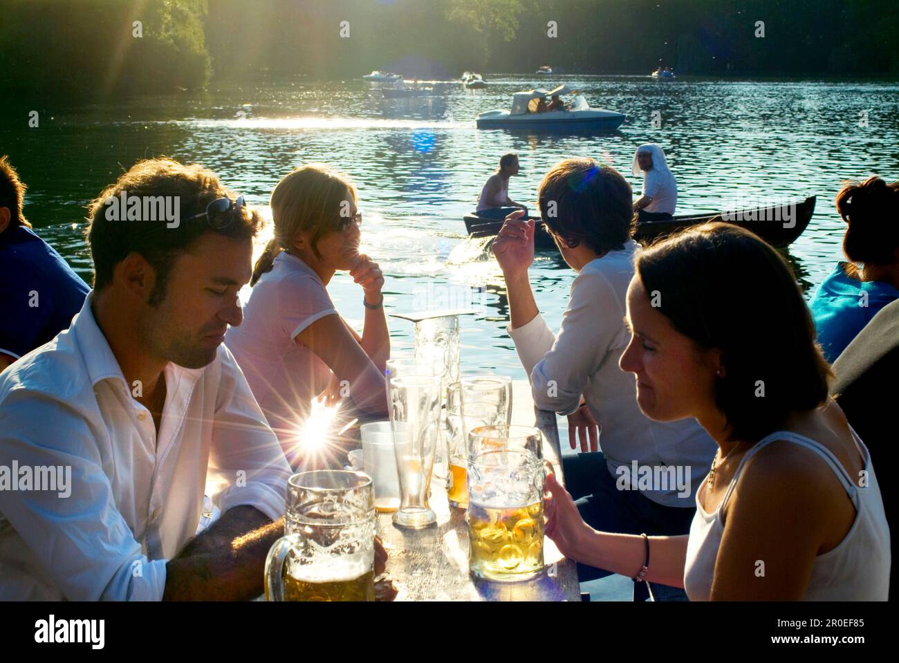 Young people in Seehaus Beergarden, English Garden, Munich, Bavaria, Germany Stock Photo