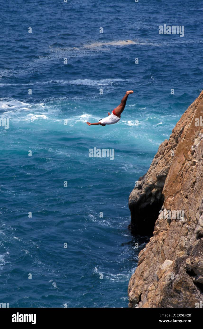 Quebrada Springer, man jumping off a cliff, Acapulco, Guerrero, Mexico, America Stock Photo