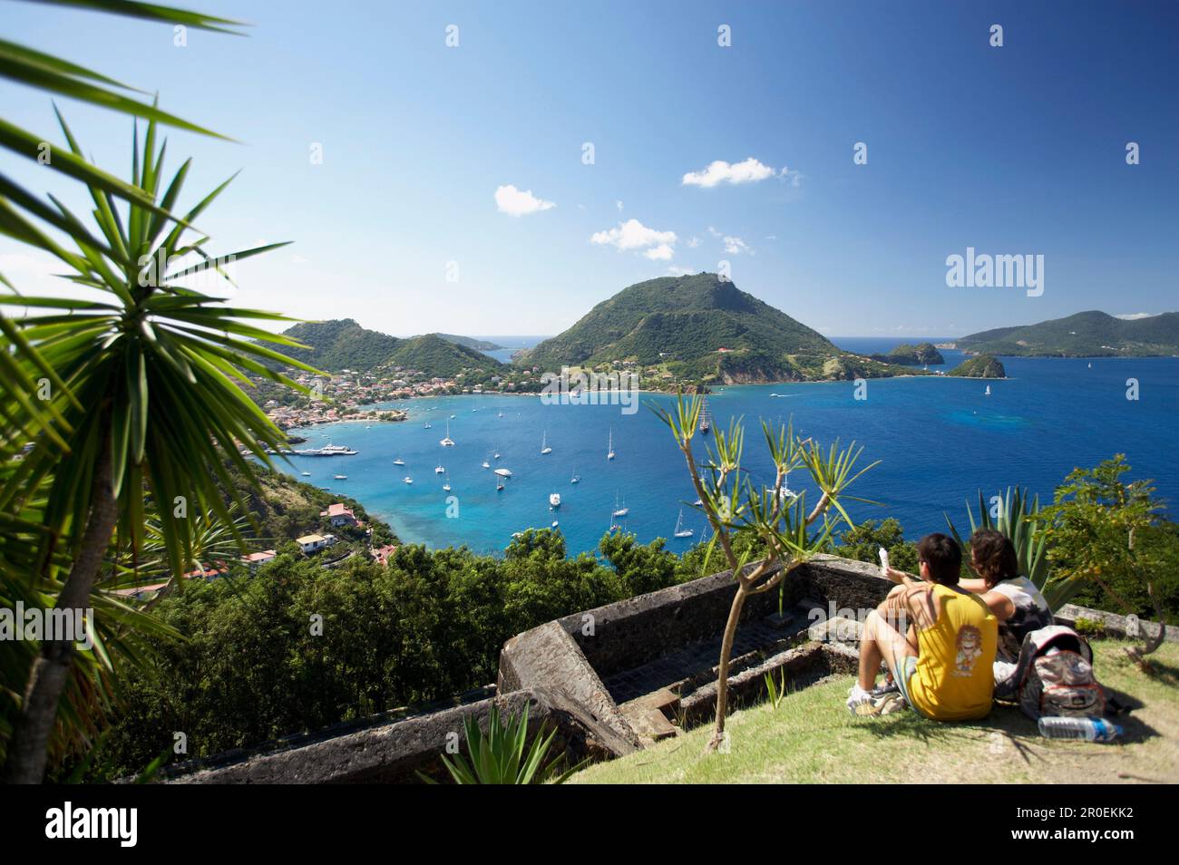 Panoramic view, Couple admiring the view, Fort Napoleon, Terre-de-Haute, Les Saintes Islands, Guadeloupe, Caribbean Sea, America Stock Photo