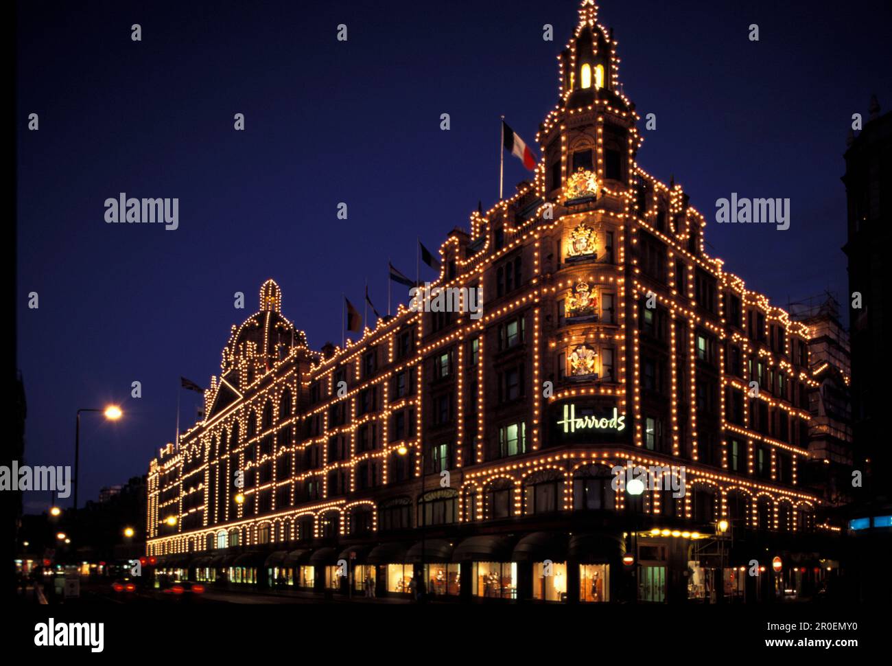 The illuminated department store Harrods at night, London, England