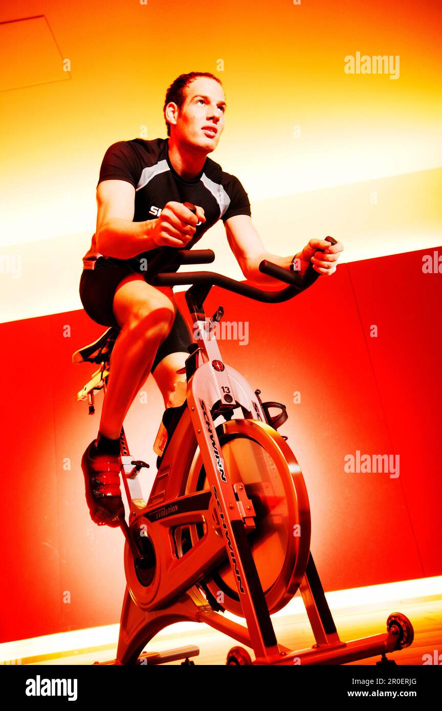 Spinning man not woman gym hi res stock photography and images