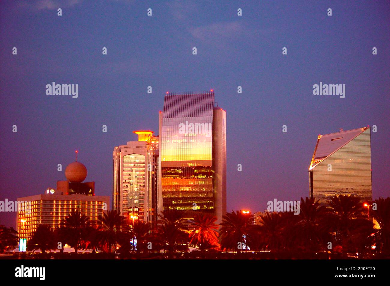 Illuminated high rise buildings in the evening, Deira, Dubai, UAE