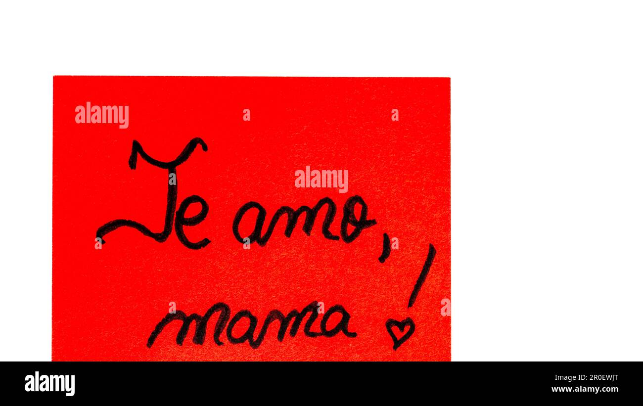 Te amo mama (I love you mom) handwriting text close up isolated on ...
