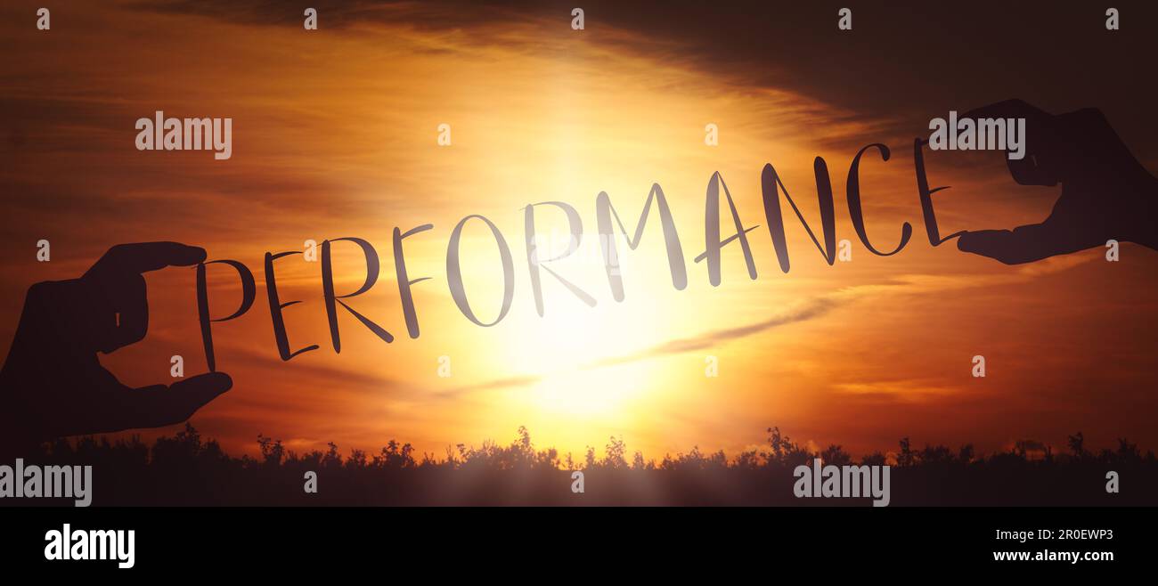 Performance - human hands holding black silhouette word Stock Photo - Alamy