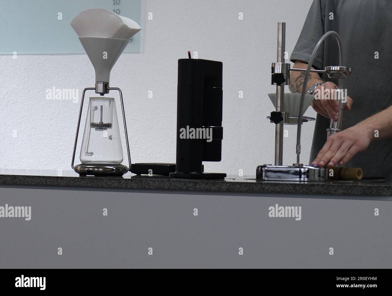man's hands making V60 coffee Stock Photo