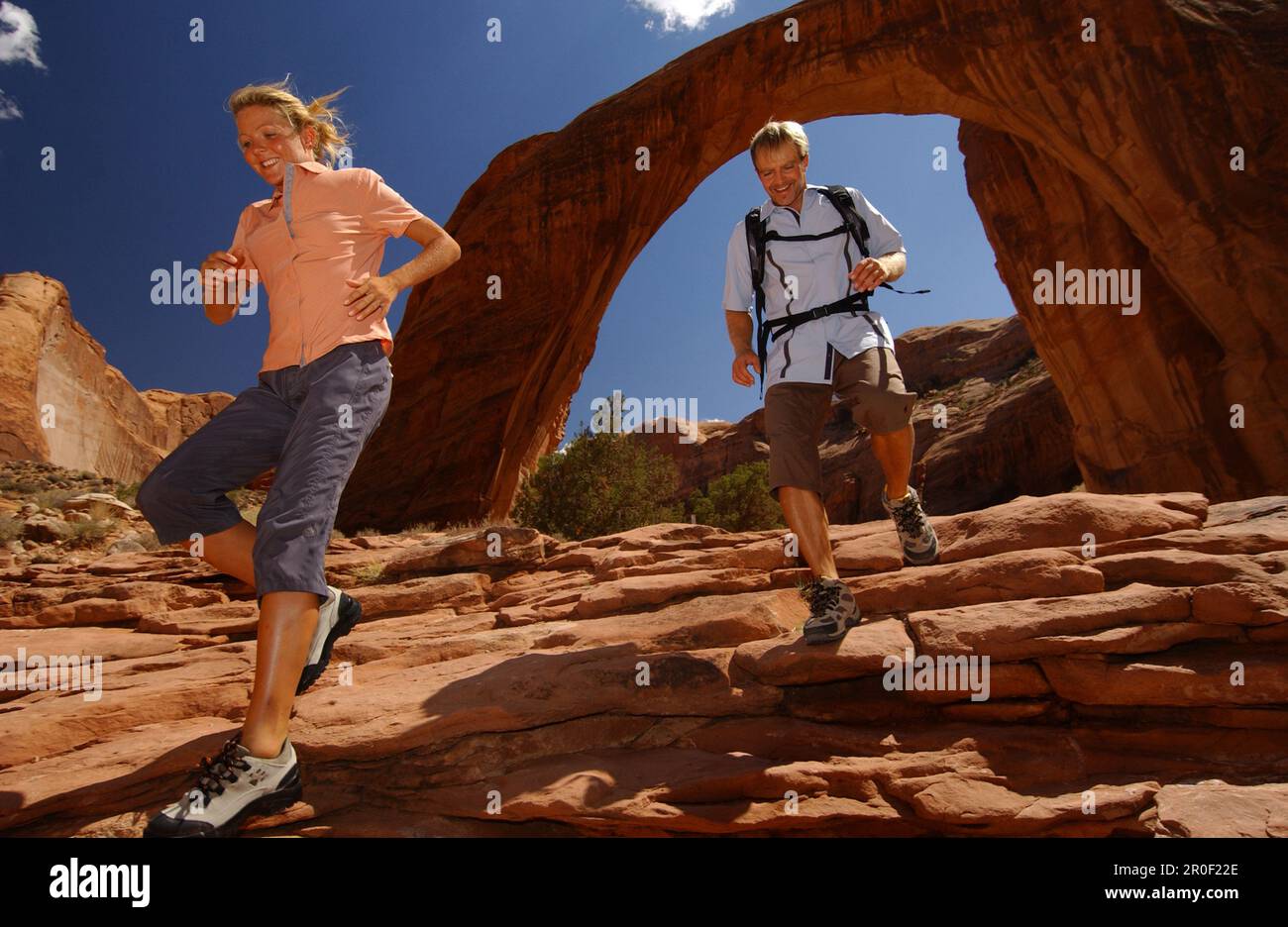 Couple hiking near Rainbow Bridge, Arizona, USA Stock Photo