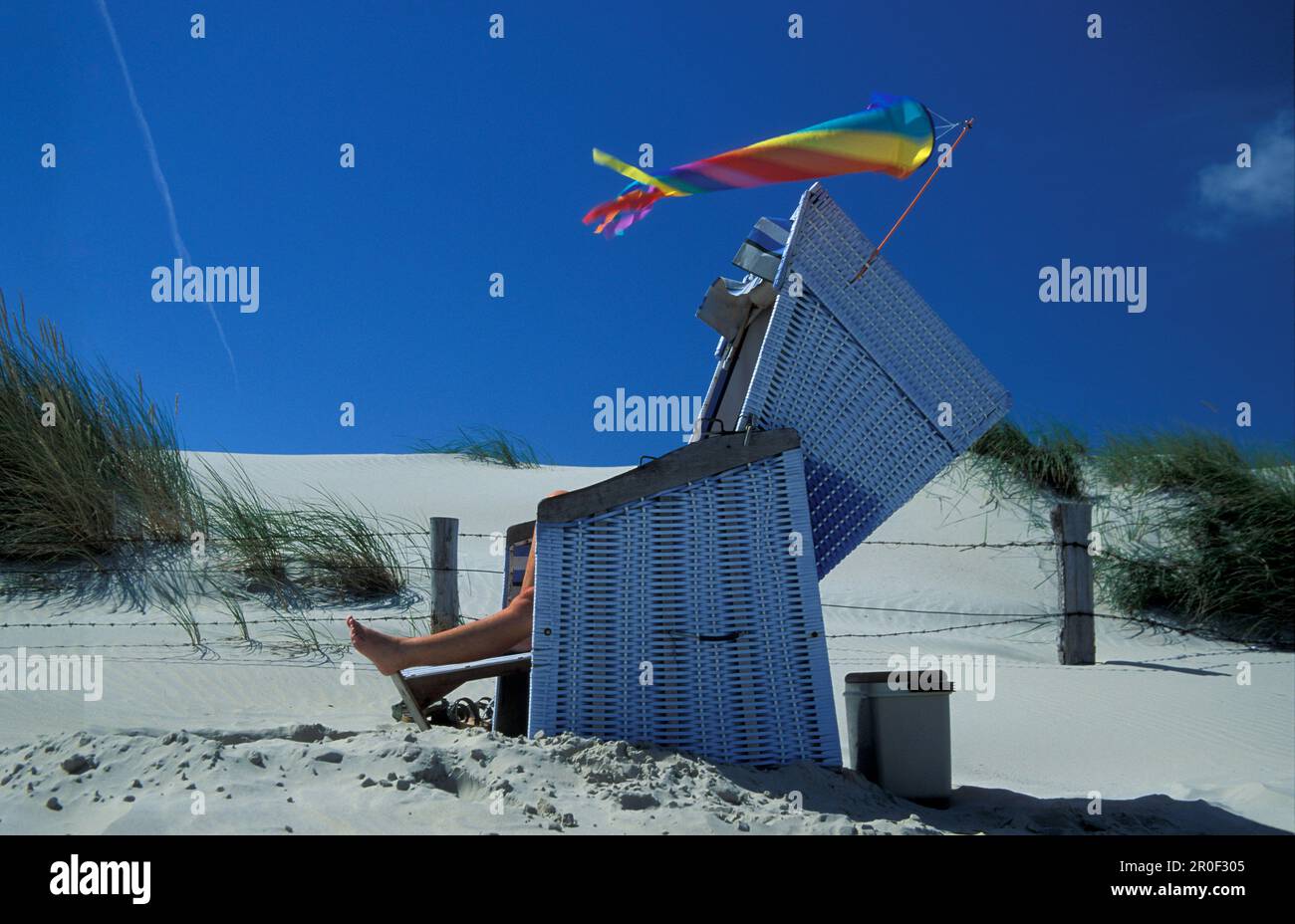 Sunbat Person lying on beach chair, Island Norderney, North Sea, Islands of ...