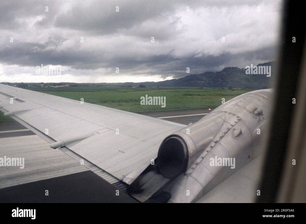 View out of the window of an airplane during the take off, Fiji, South Pacific Stock Photo