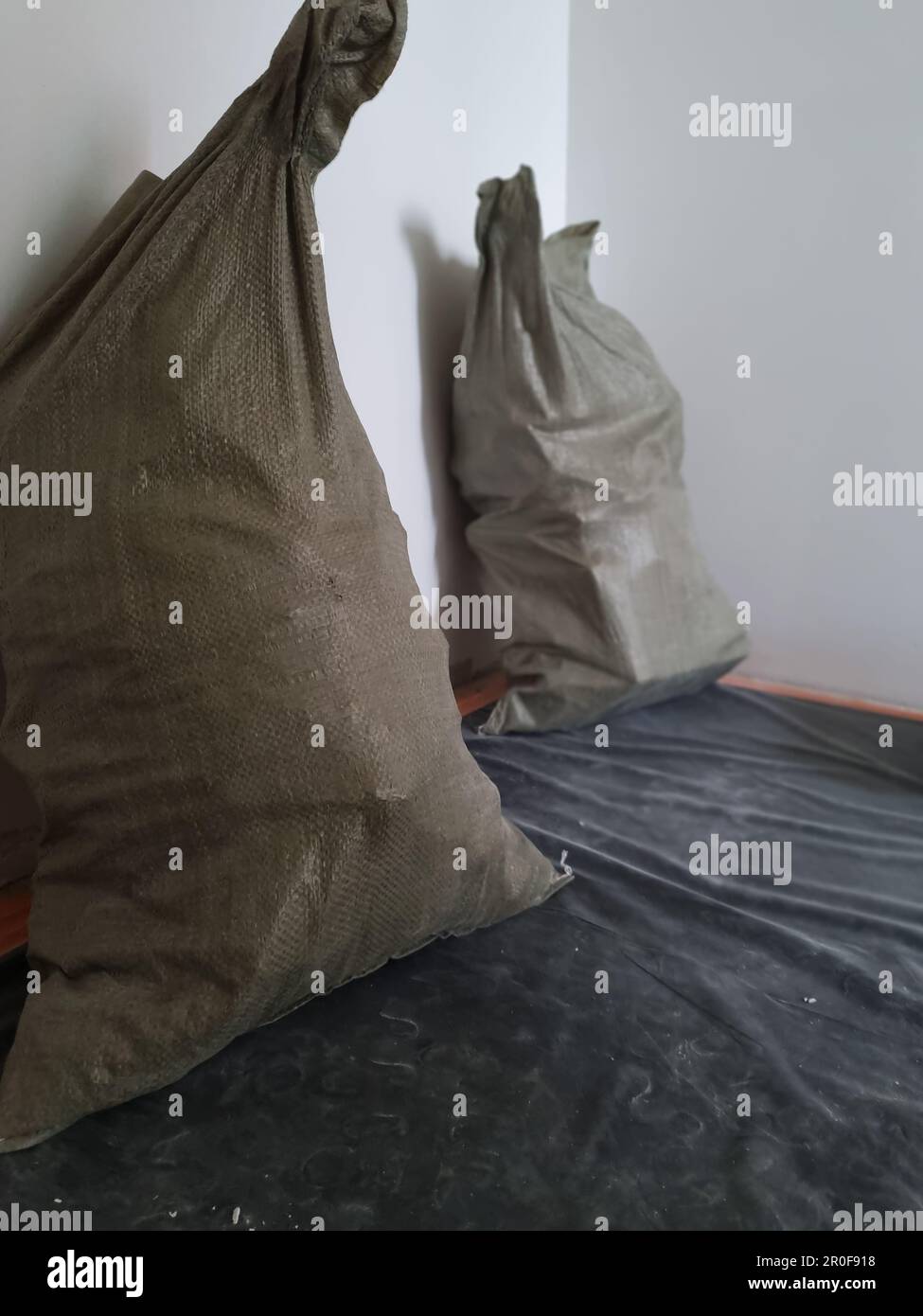 Garbage and waste from dismantling in bags for disposal. One of the stages of apartment