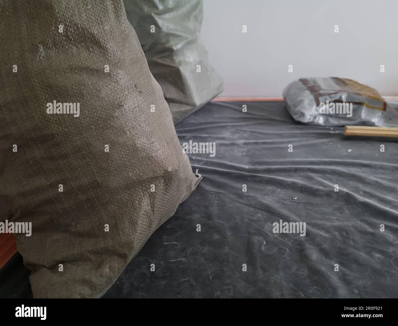 Garbage and waste from dismantling in bags for disposal. One of the stages of apartment