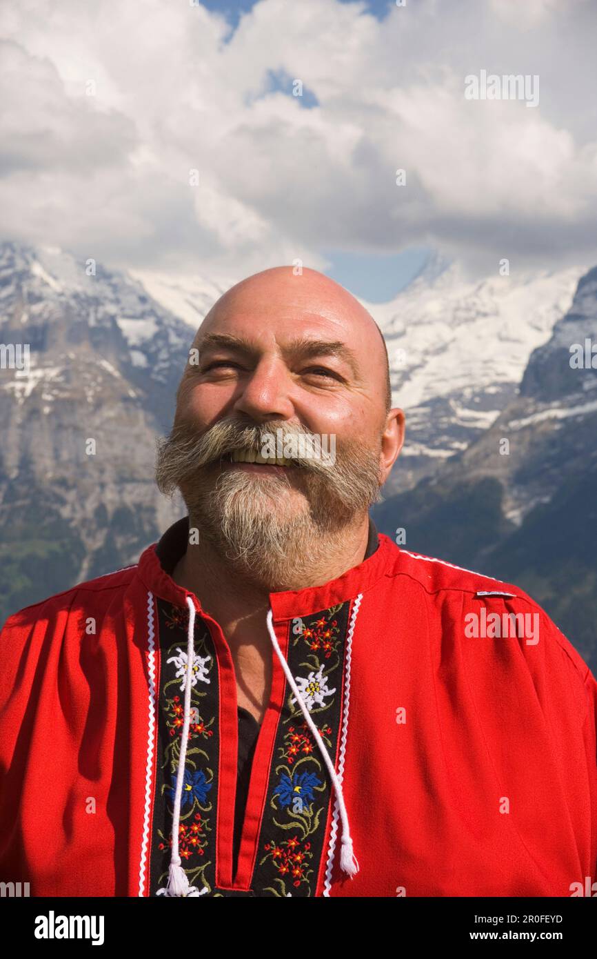 Swiss man smiling in the camera, Portrait, Bussalp 1800 m, Grindelwald