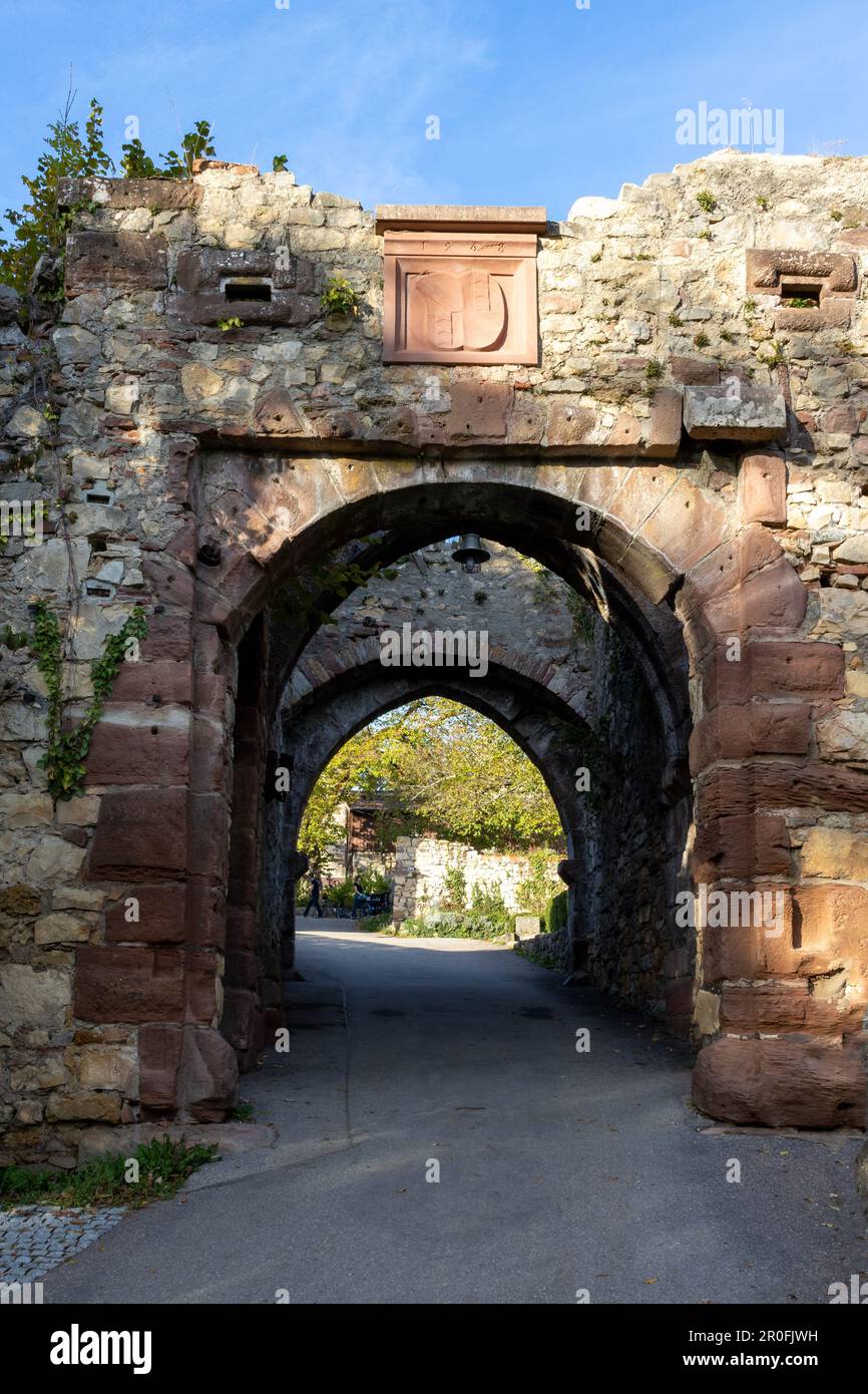 A majestic stone archway leading to the entrance of an ancient castle of Roetteln, Binzen, Germany Stock Photo