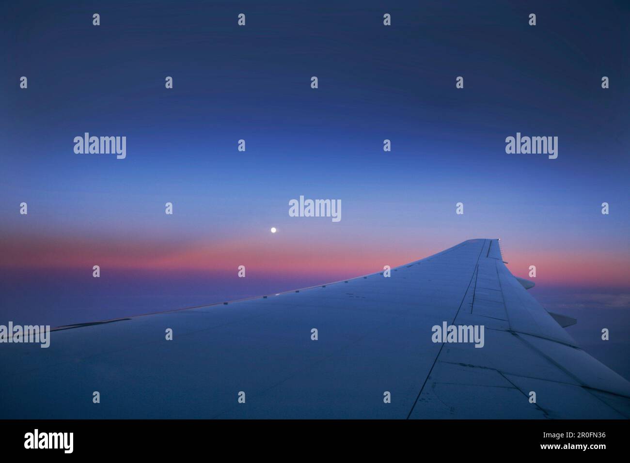 Airplane wing at daybreak hi-res stock photography and images - Alamy