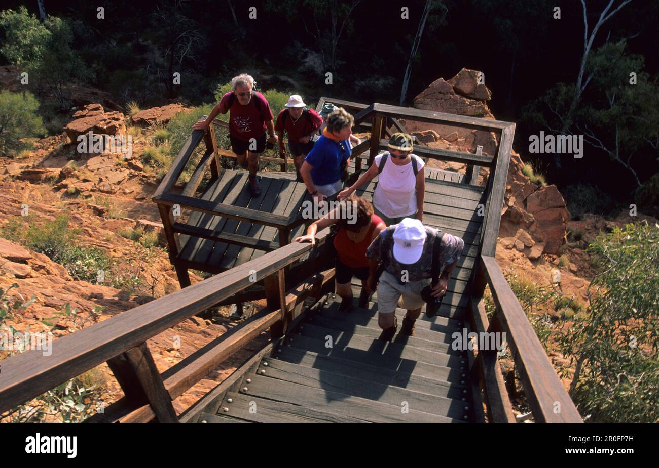Hikers In Kings Canyon In Watarrka National Park Central Australia hikers-in-kings-canyon-in-watarrka-national-park-central-australia