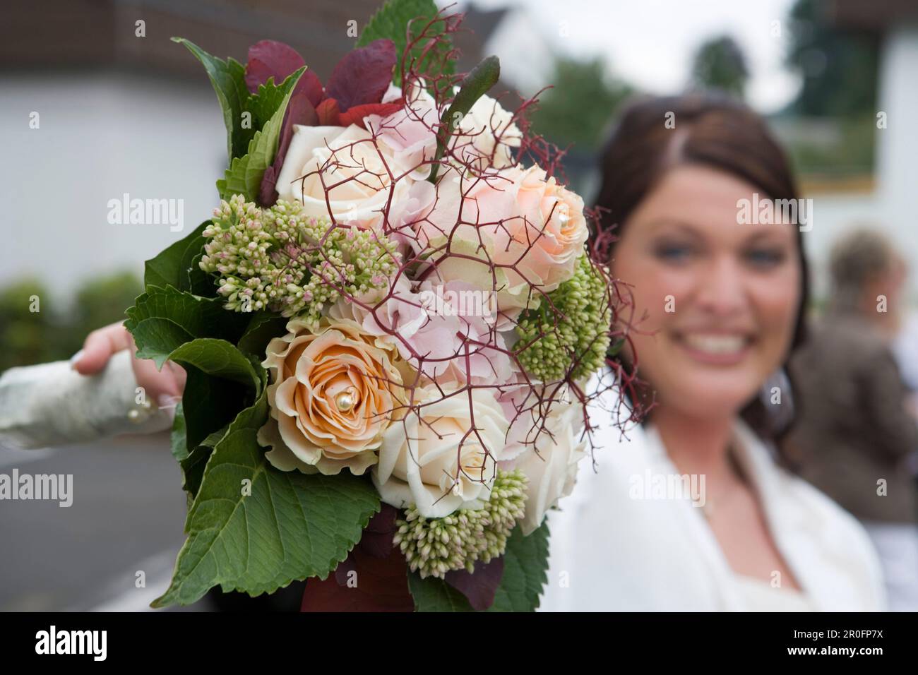 Bride with bridal bouquet, Hauneck, Hesse, Germany Stock Photo
