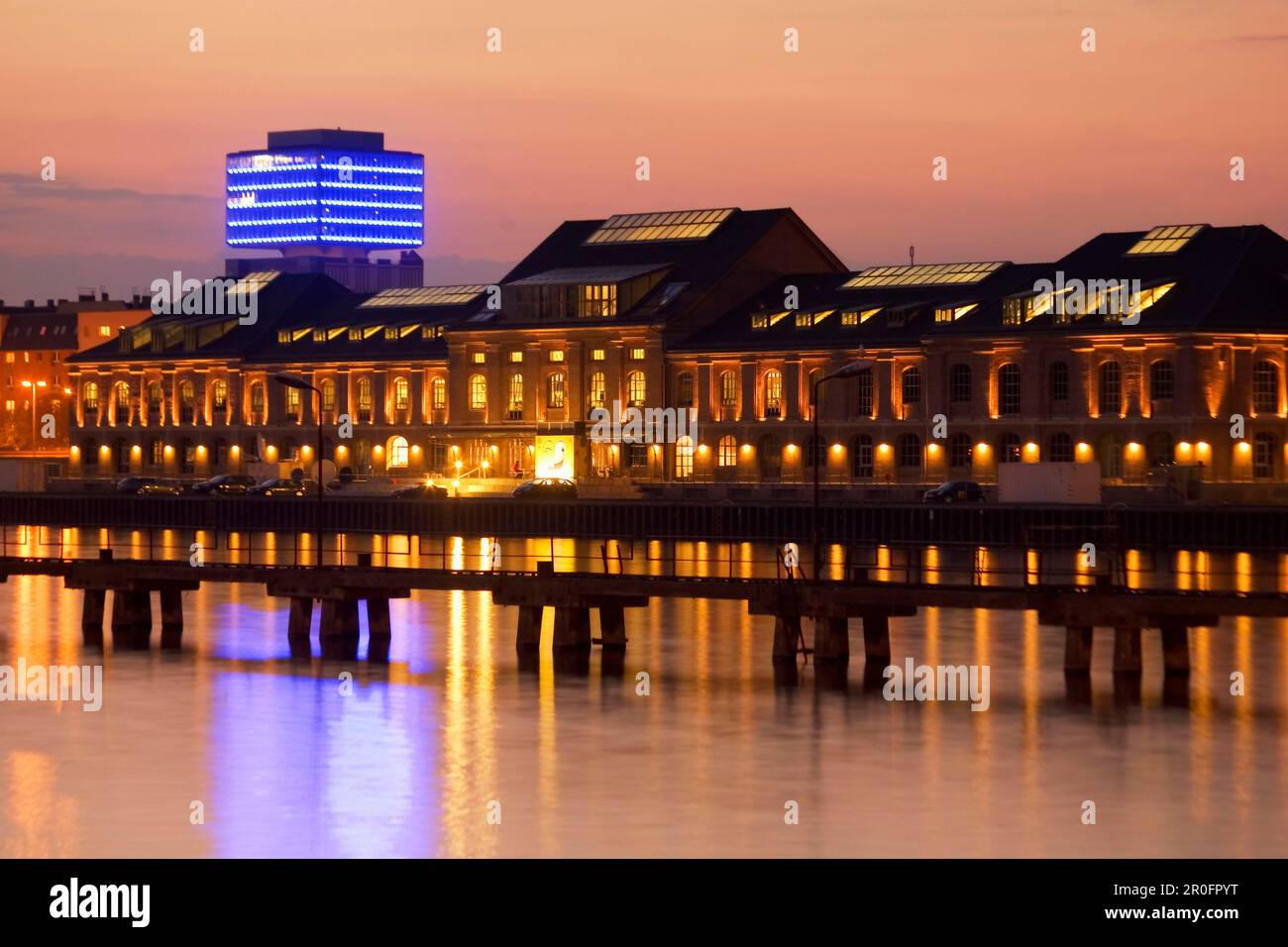 Berlin former east harbour, river spree , MTV studios, background Oberbaum city skyscaper illuminated Stock Photo