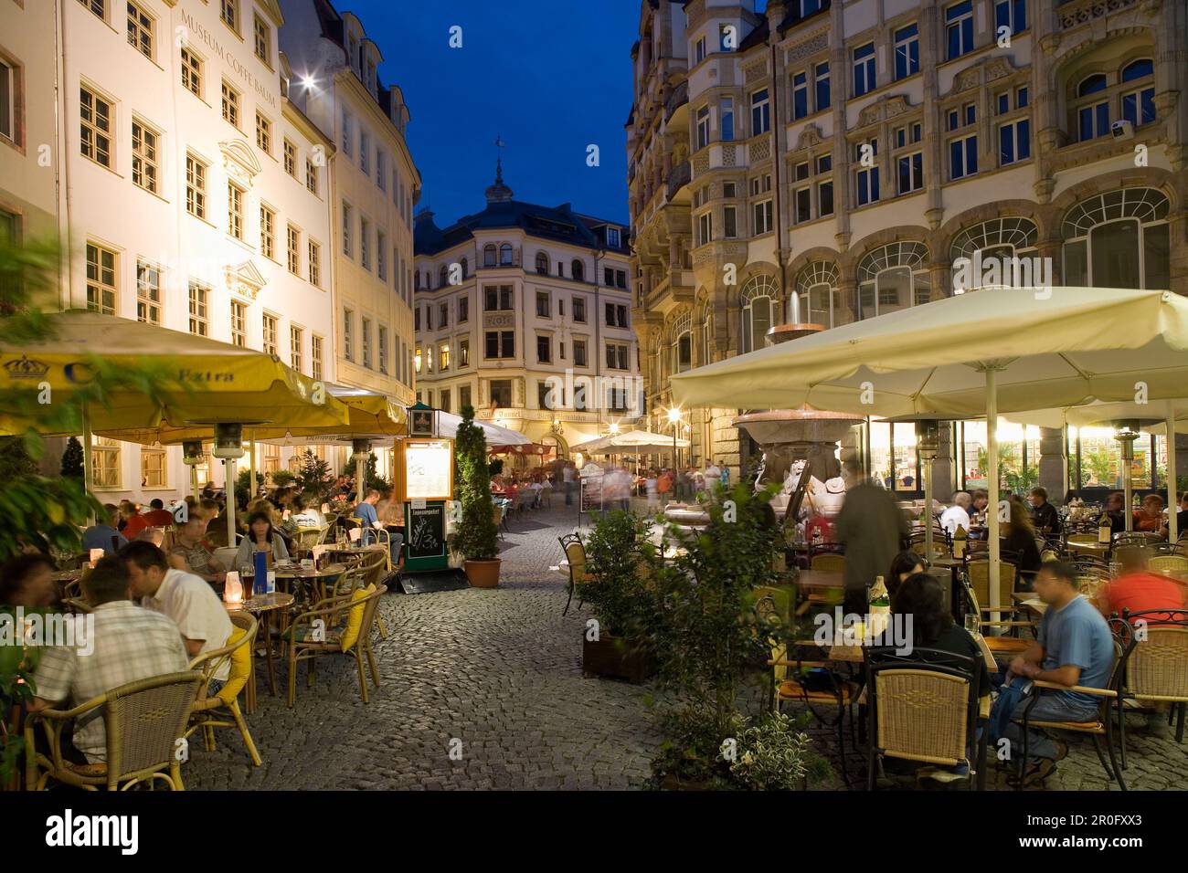 Guests sitting in pavement cafes in the evening, Leipzig, Saxony