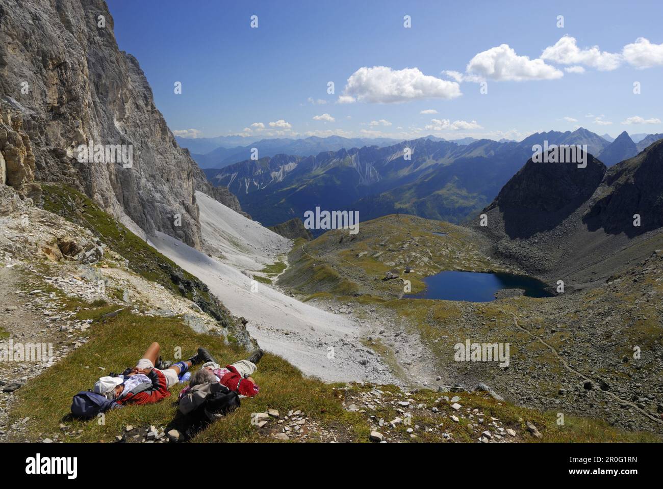 Two hikers lying on hi-res stock photography and images - Alamy