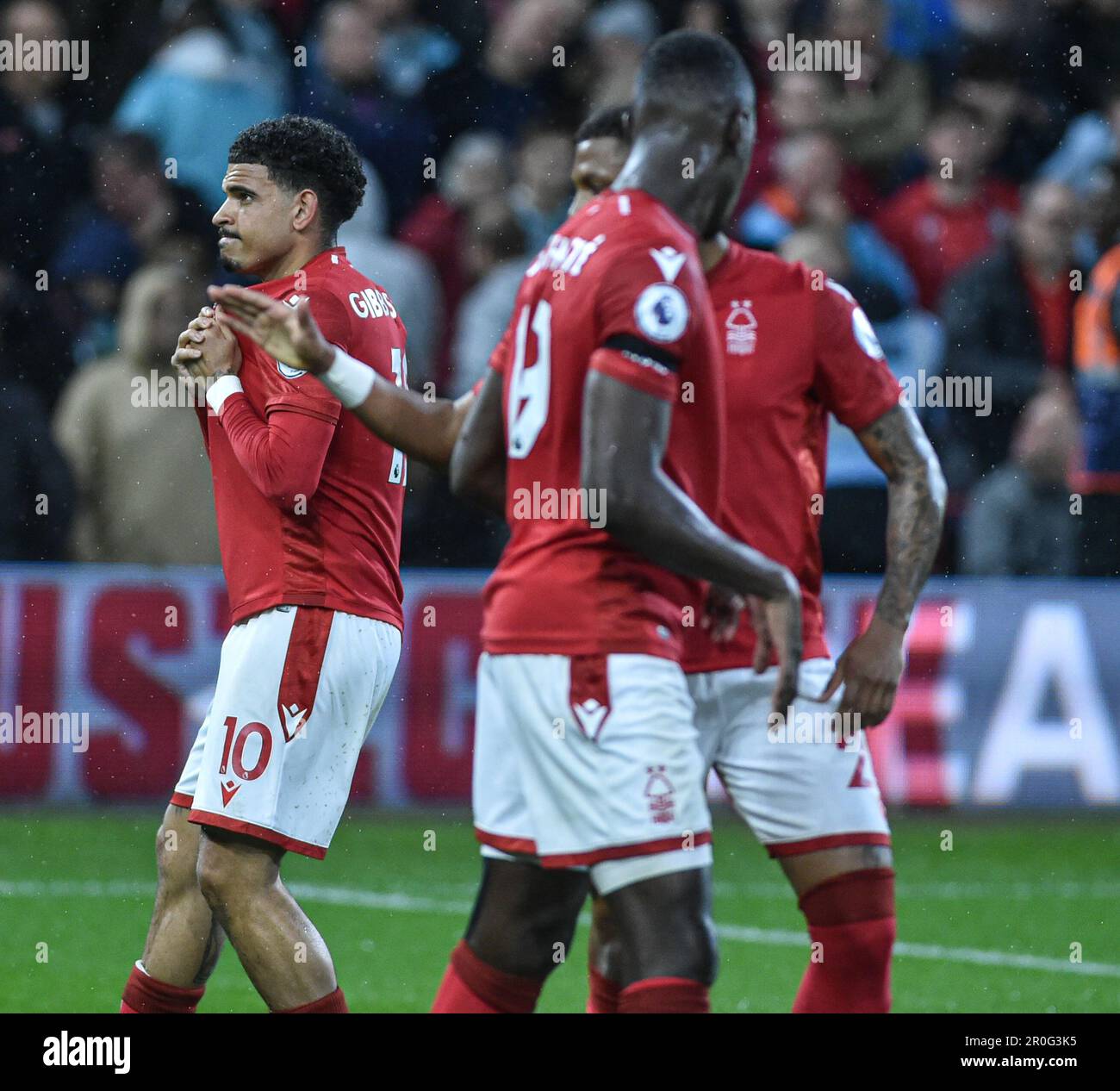 The City Ground, Nottingham, UK. 8th May, 2023. Premier League Football, Nottingham Forest versus Southampton; Morgan Gibbs-White of Nottingham Forest holds his shirt badge and celebraters scoring from the penalty spot in the 44th minute to make it Forest 3-1 Southampton Credit: Action Plus Sports/Alamy Live News Stock Photo