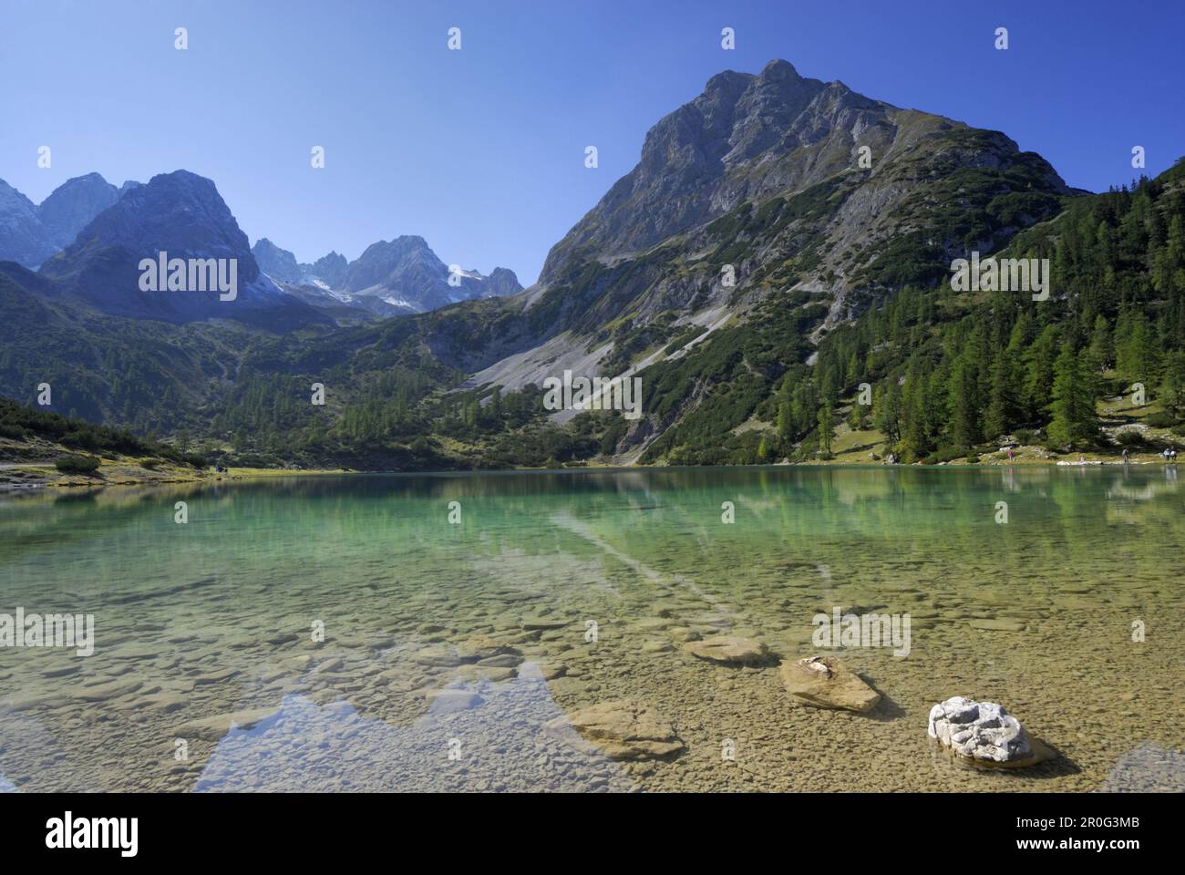 Reflection of mountains on Lake Seebensee, Mieming range, Tyrol, Austria Stock Photo