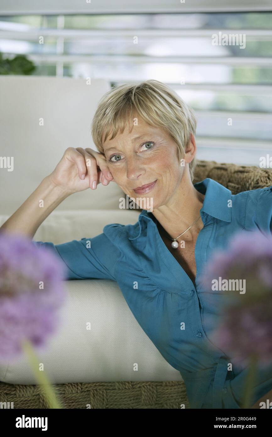 Mature woman smiling at camera, Styria, Austria Stock Photo