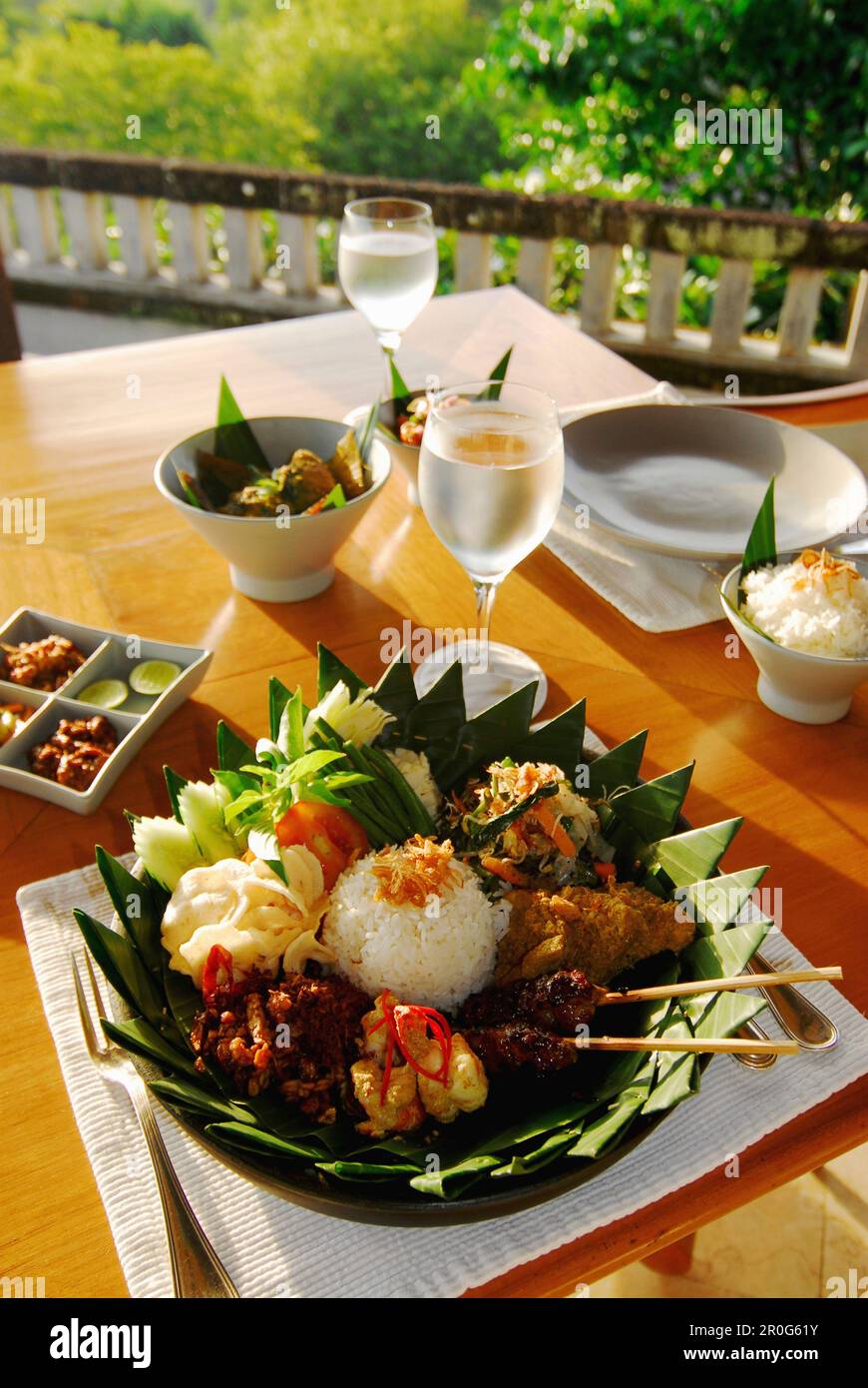 Nasi Campur, indonese breakfast on the terrace of Amanusa Resort, Nusa Dua, Southern Bali, Indonesia, Asia Stock Photo
