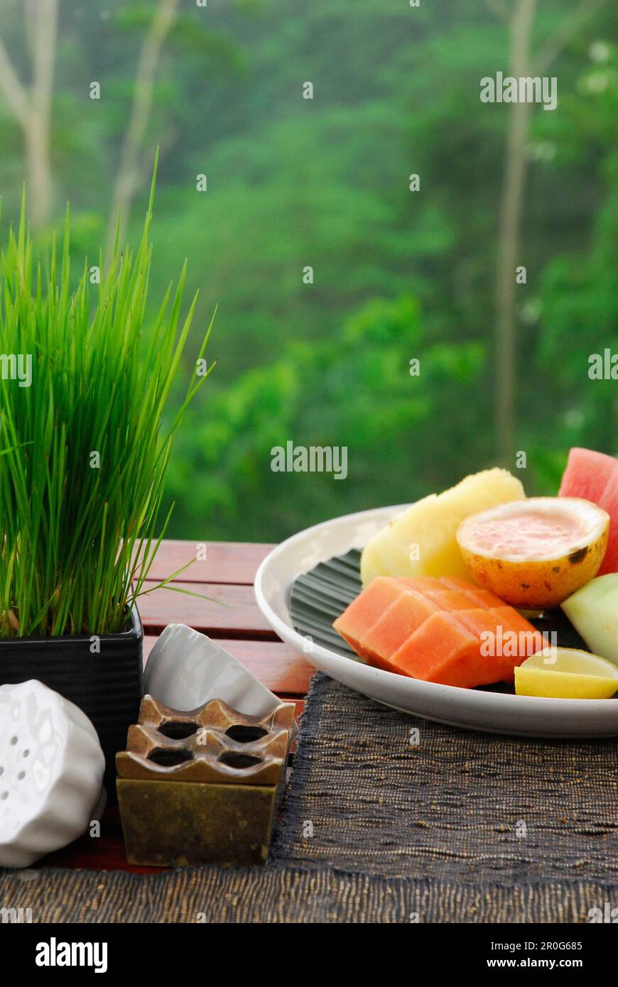 A table is laid out for breakfast in nature, Kupu Kupu Barong Resort, Ubud, Indonesia, Asia Stock Photo