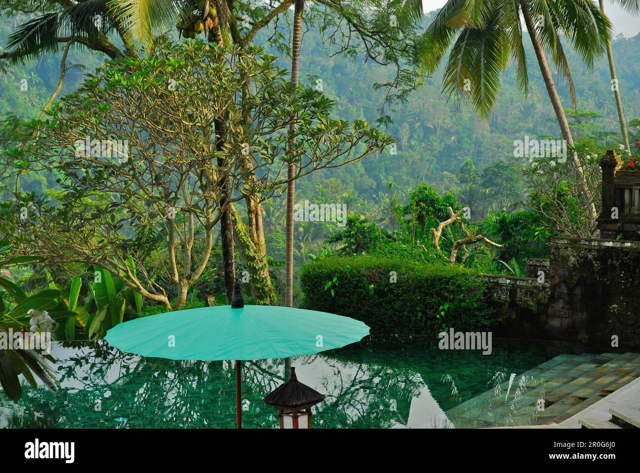 Pool and sunshade at the garden of Amandari Resort, Yeh Agung valley