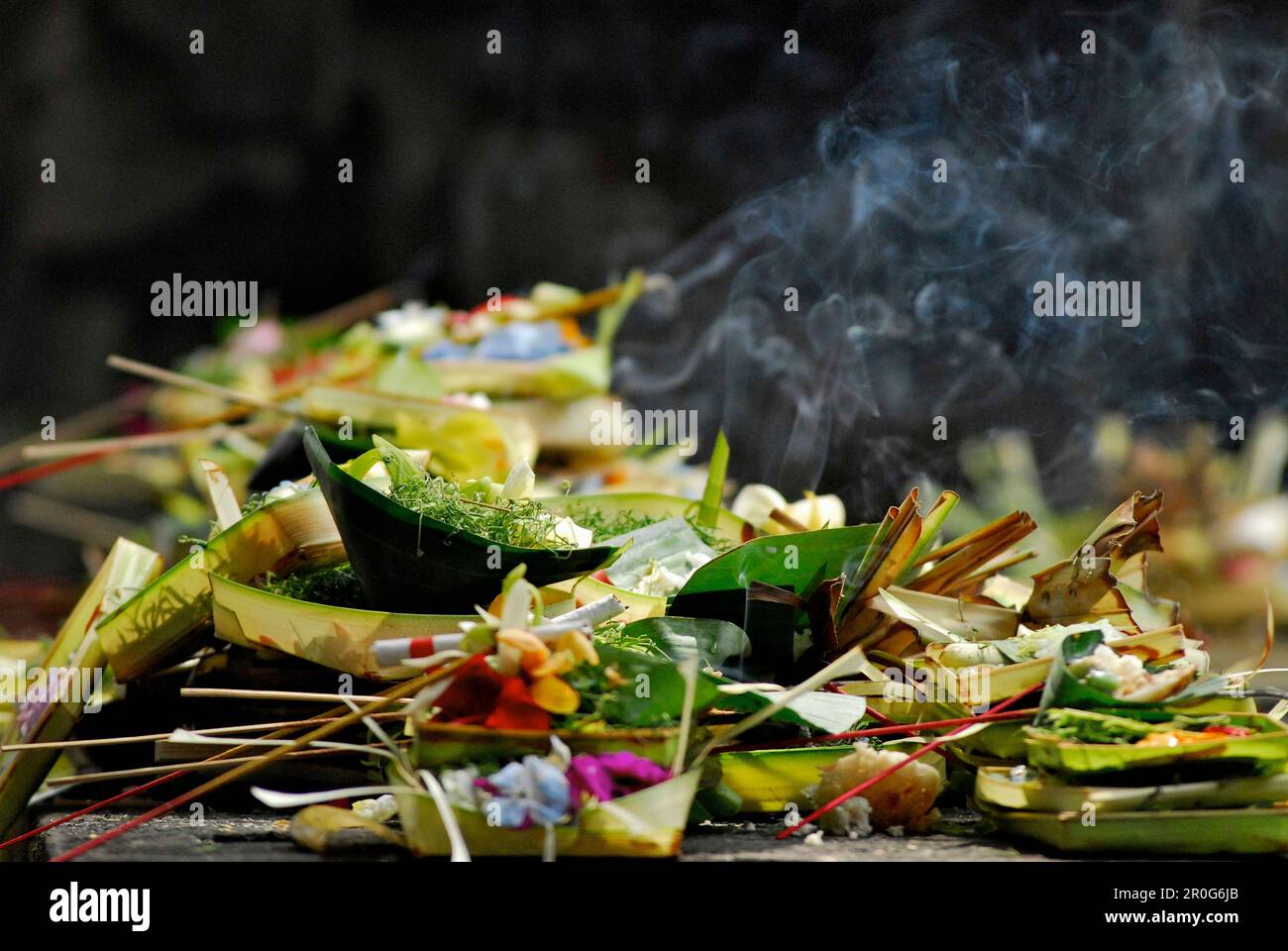 Oblation with incense sticks in a temple, Ubud, Bali, Indonesia, Asia