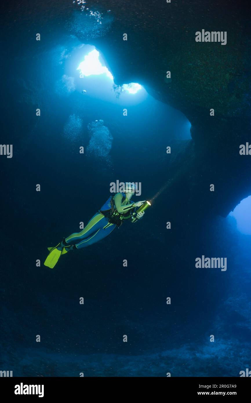 Diver in Blue Hole Cave, Micronesia, Palau Stock Photo