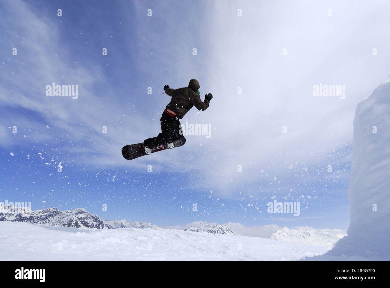 Snowboarder in mid-air, ski area Soelden, Oetztal, Tyrol, Austria Stock Photo