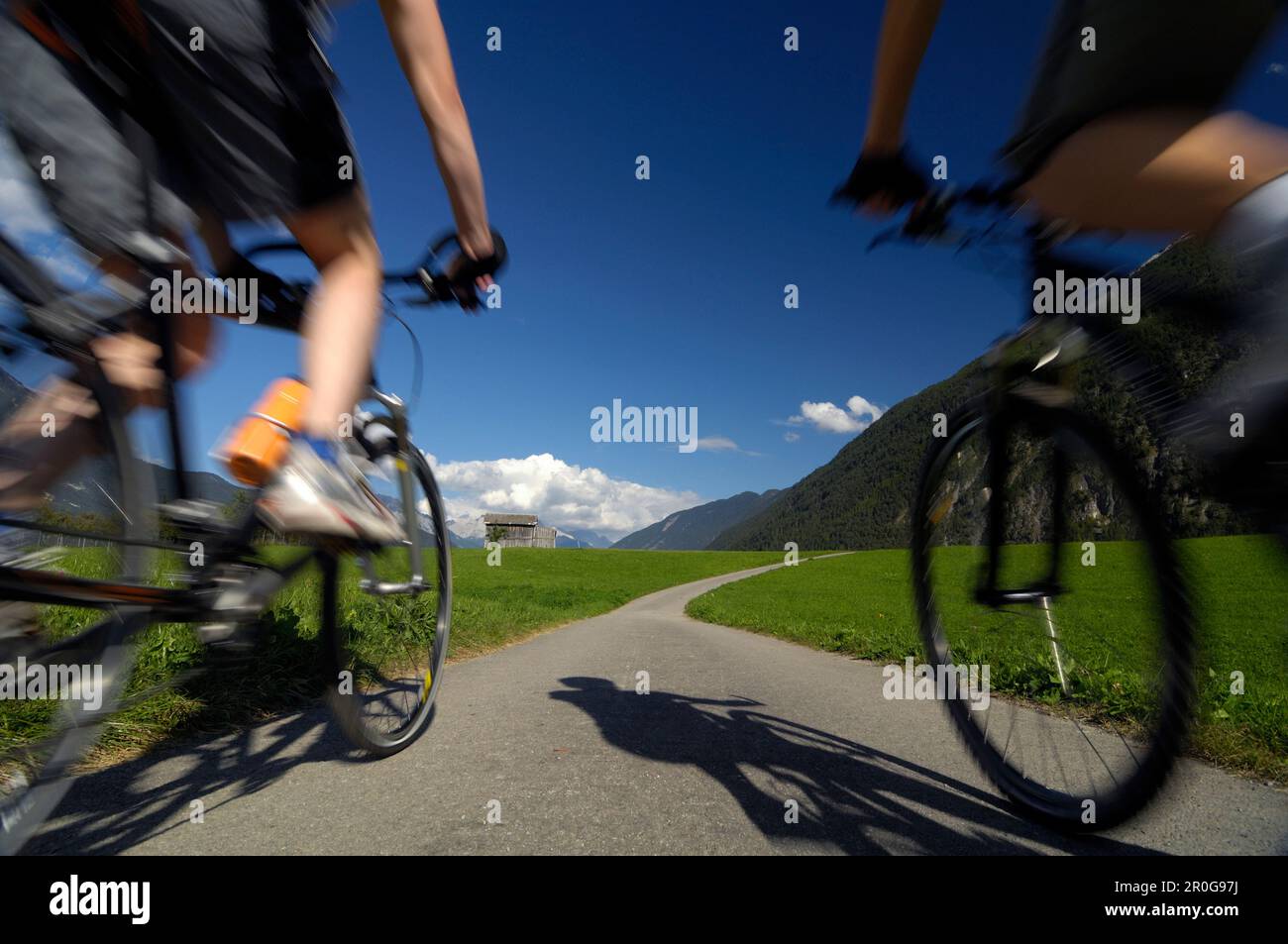 Couple on a mountain bike tour near Imst, Tyrol, Austria Stock Photo