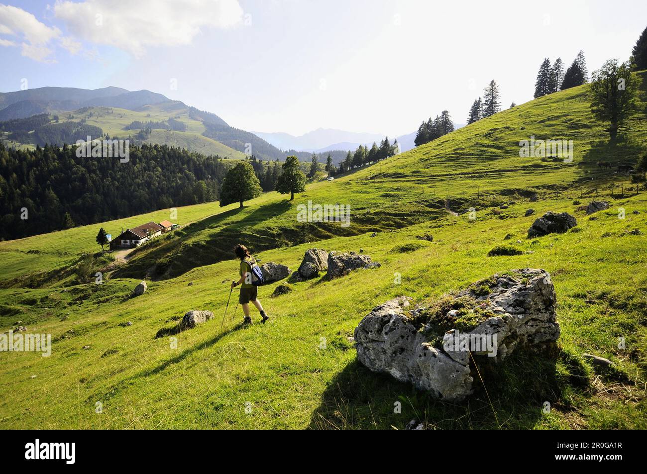 Hiker passing Sudelfeld, near Bayrischzell, Bavaria, Germany Stock Photo