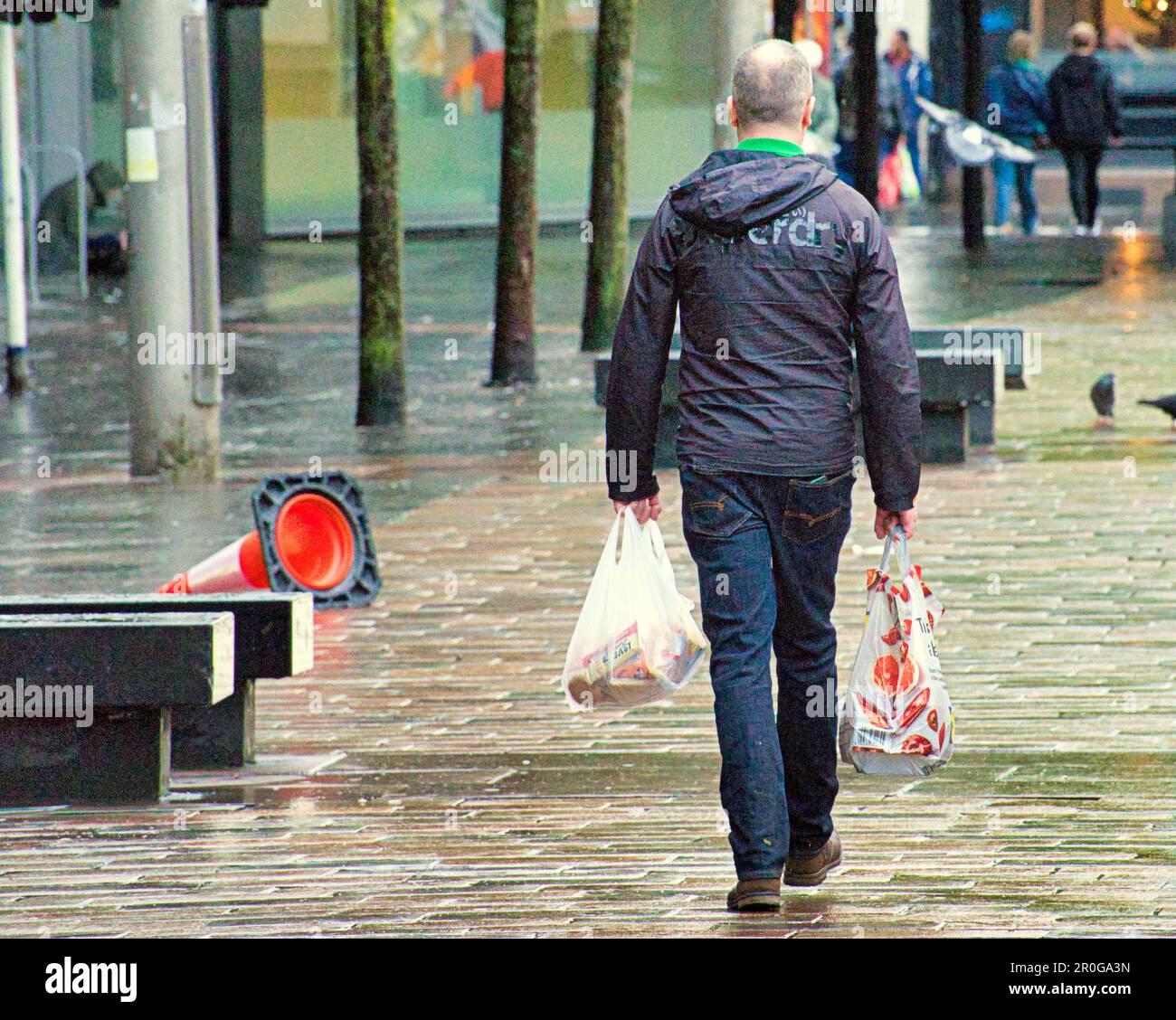 man with shopping bags on the style mile Stock Photo