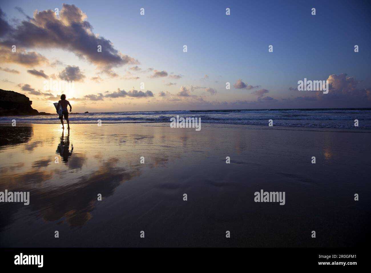 Surfer at beach, Istmo de la Pared, Fuerteventura, Spain Stock Photo ...